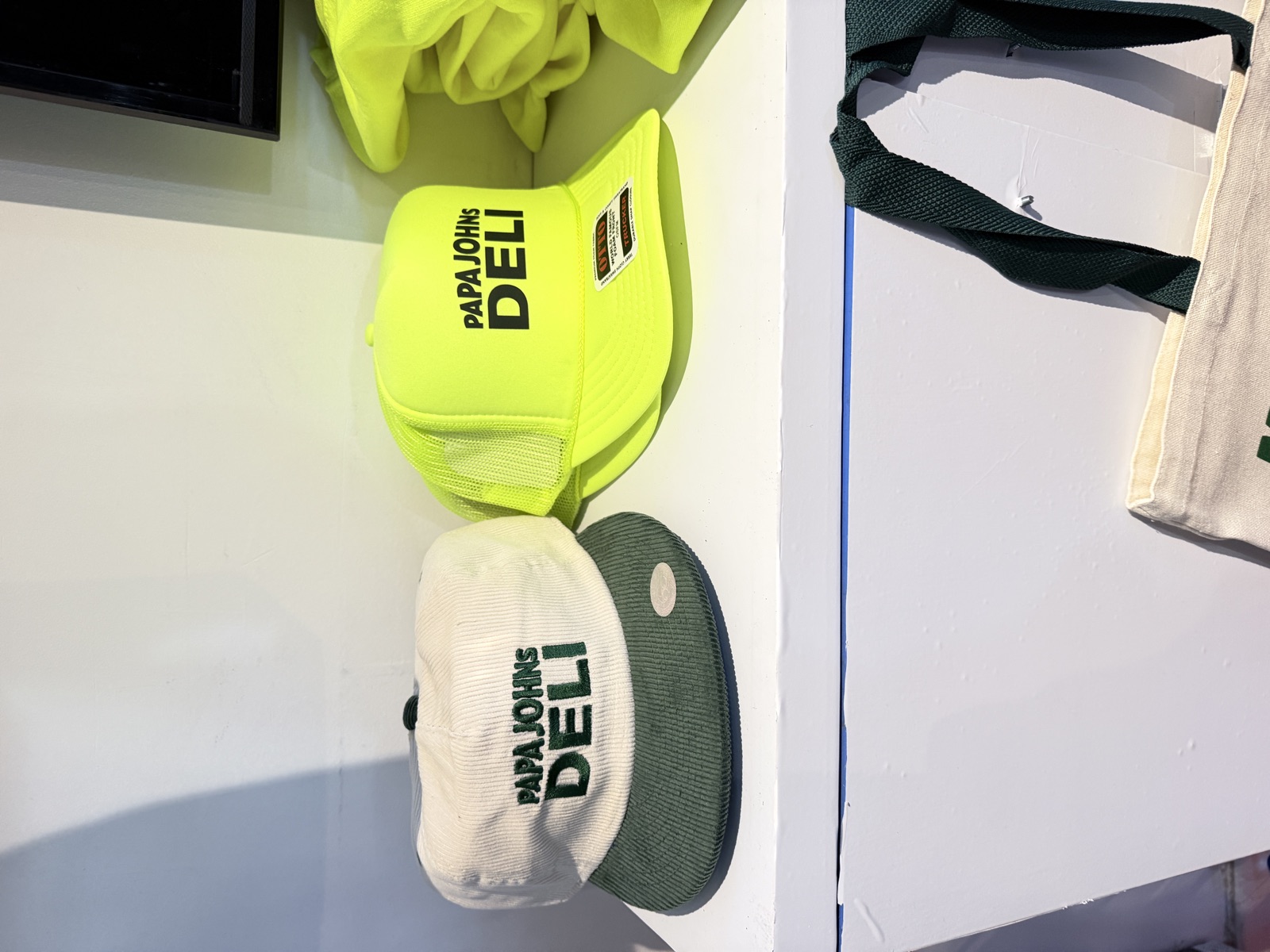 Finished shirts, hats, patches, and event merch for Live Event Embroidery